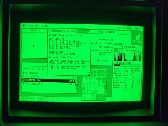 Монитор IBM 5151 с зелёным люминофором показывает рабочий стол os8088 с одновременно открытыми окнами Note Pad, About, Clock, Task Manager, Minesweeper и Disk