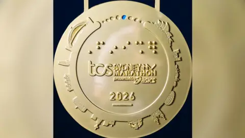 Медаль Sydney Marathon, опубликованная организаторами в социальных сетях
