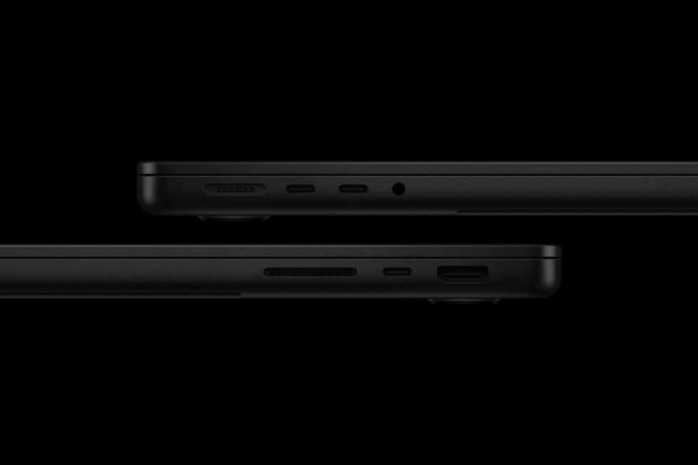 Две стороны нового 14-дюймового MacBook Pro показывают набор портов ноутбука.